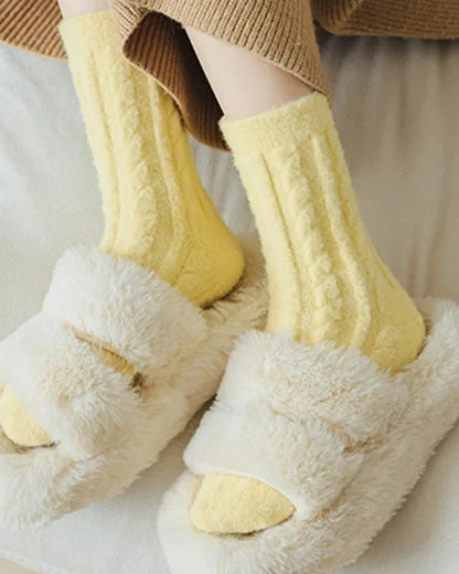 Long fluffy socks with a braided pattern