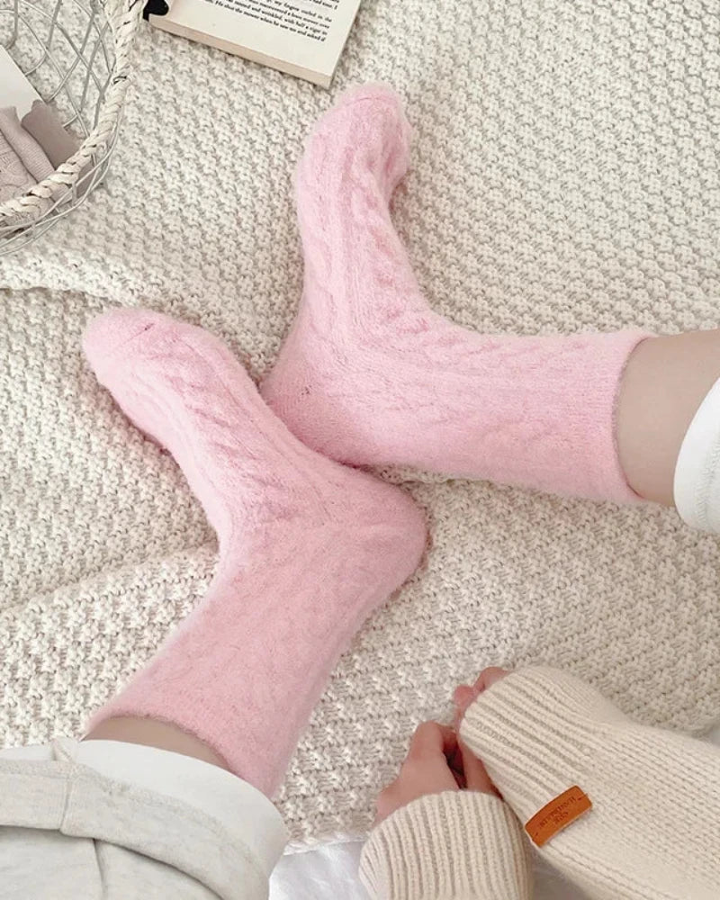 Long fluffy socks with a braided pattern