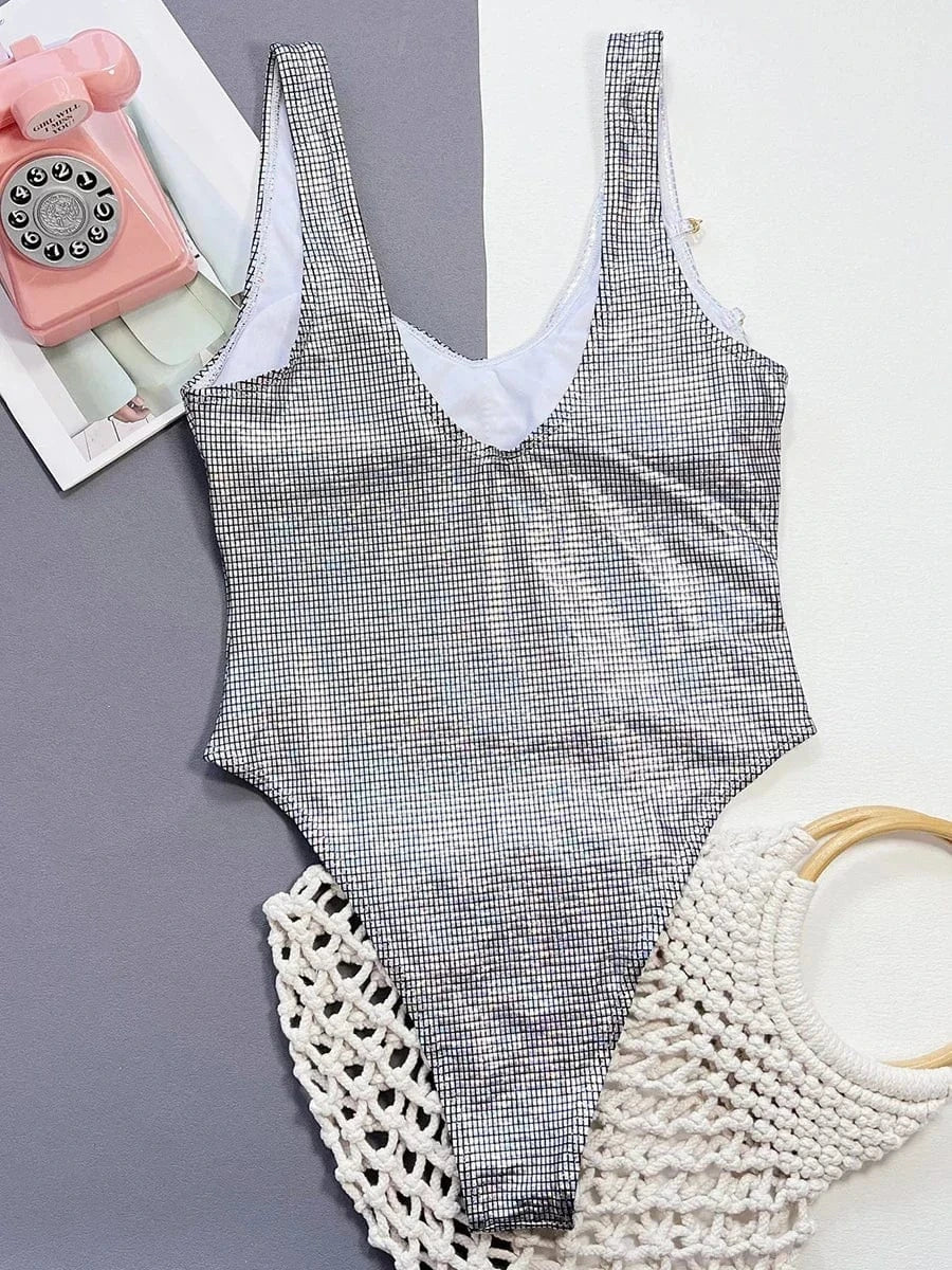 One-piece swimsuit with decorative chains