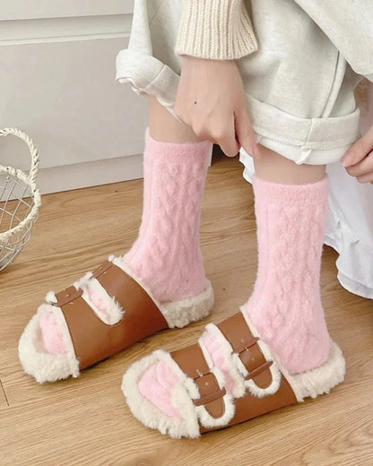 Long fluffy socks with a braided pattern