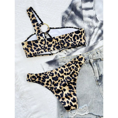 Two-piece leopard print swimsuit with an asymmetrical one-shoulder design.