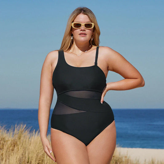 Plus size swimsuit with an asymmetrical cut