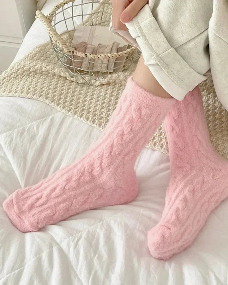 Long fluffy socks with a braided pattern