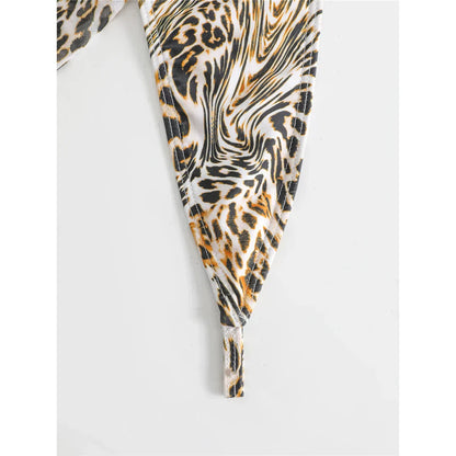 Two-piece leopard print swimsuit with a tie-up bikini top.