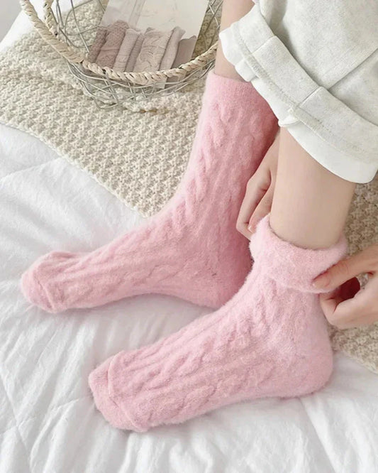 Long fluffy socks with a braided pattern