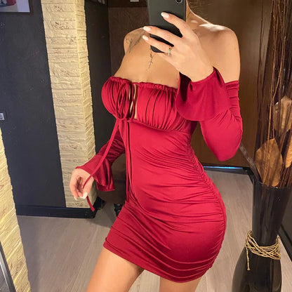Beach dress with exposed shoulders