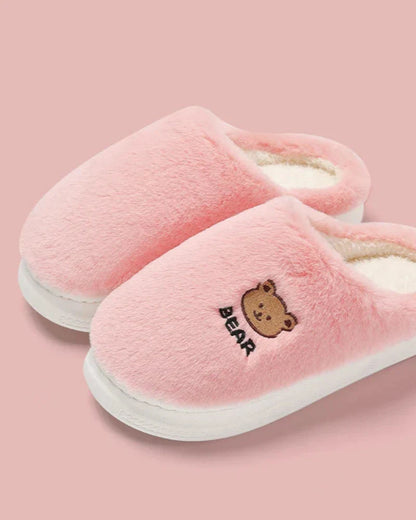 Warm fluffy slippers with a bear