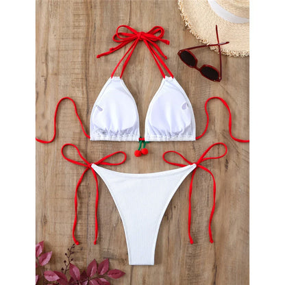 Two-piece swimsuit with ties at the hips and neck.