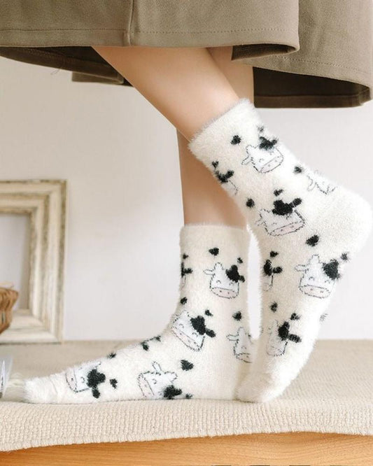 Long patterned fluffy cow socks