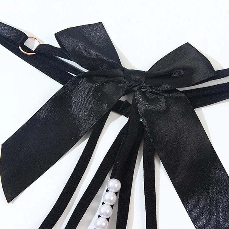 String briefs with decorative pearls in the gusset.