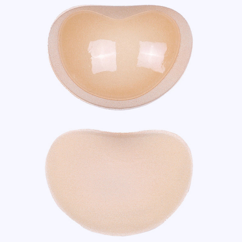 Push-up inserts with a silicone, adhesive part