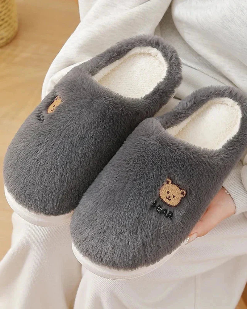 Warm fluffy slippers with a bear