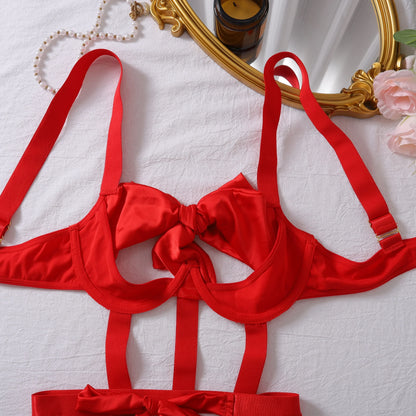 Body with a deep neckline and a bow on the bust.