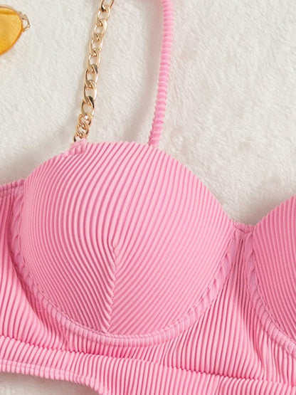 One-piece swimsuit with cut-outs at the waist