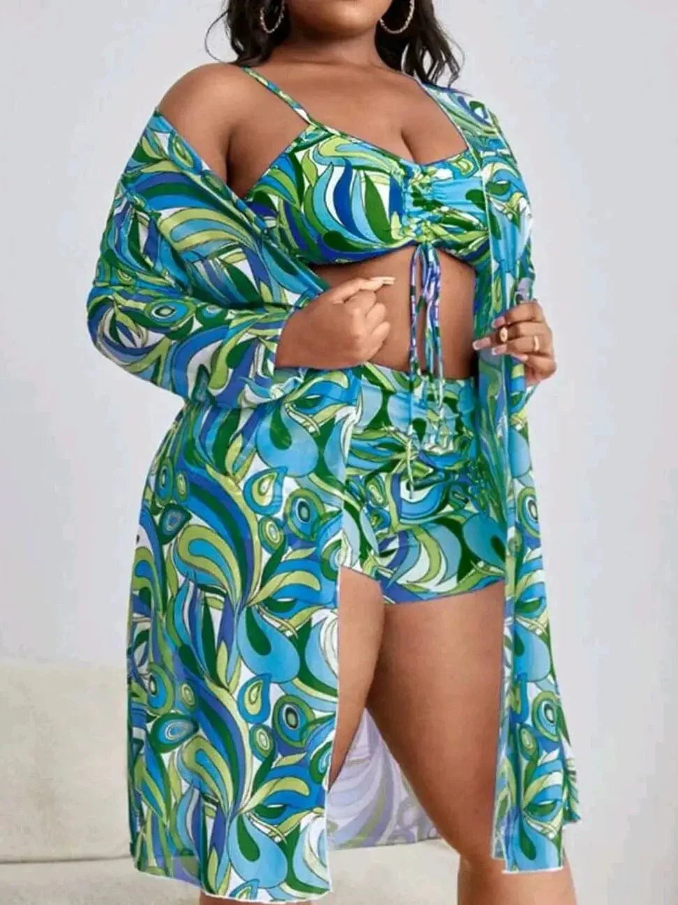 Plus size two-piece swimsuit with decorative tying.