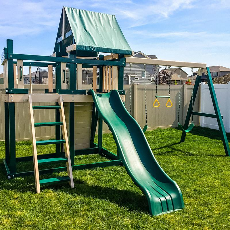 Congo Monkey Playsystem Adventurer Wooden Outdoor Swing Set with Fort Wave Slide and Rock Wall