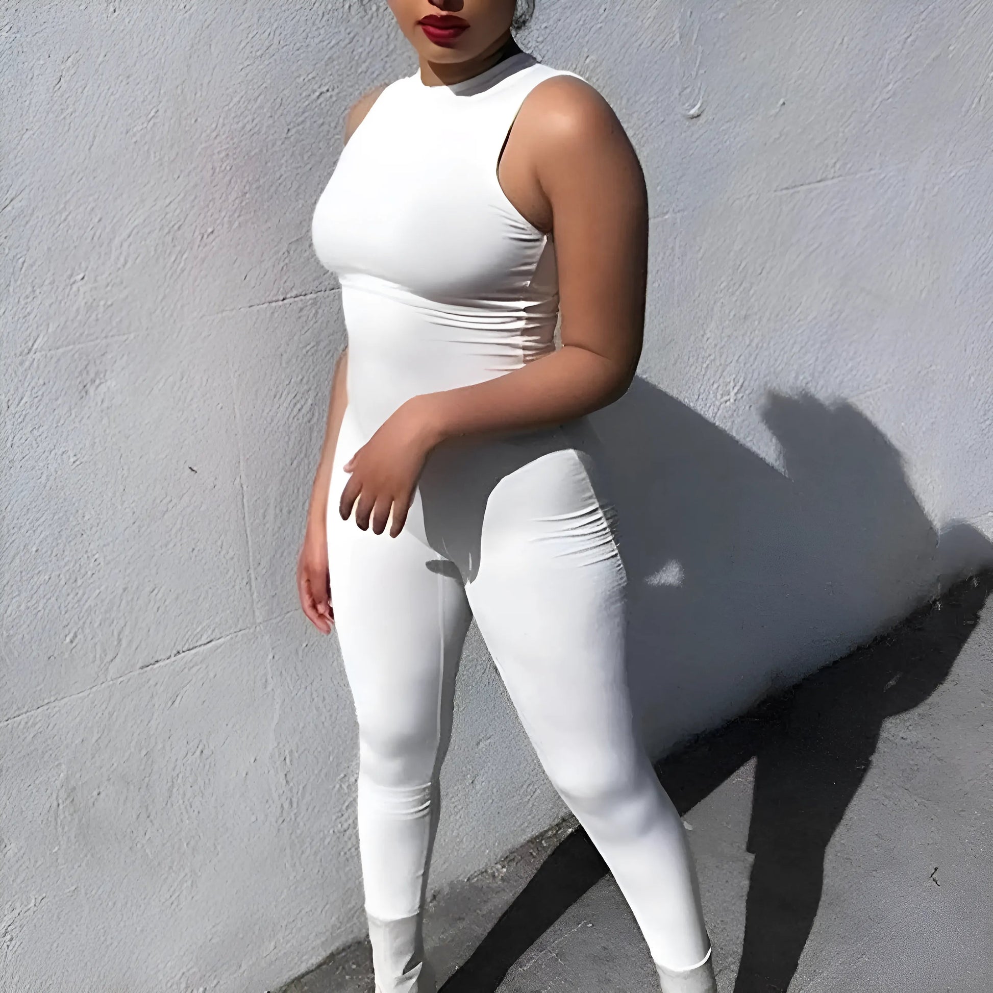 White One-Piece Sports Outfit with High Neck