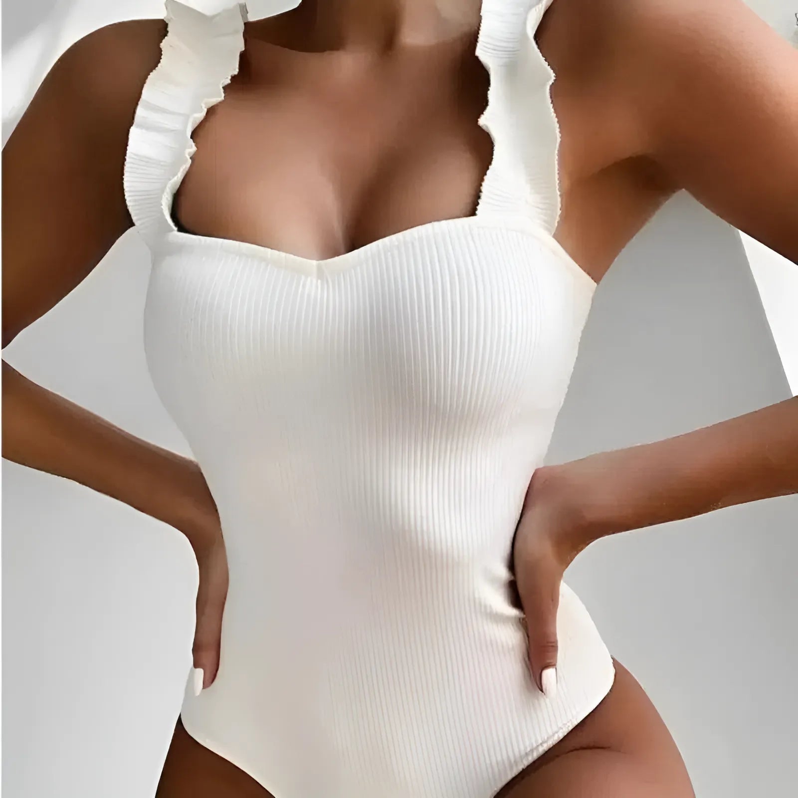 White One-Piece Swimsuit with Decorative Straps