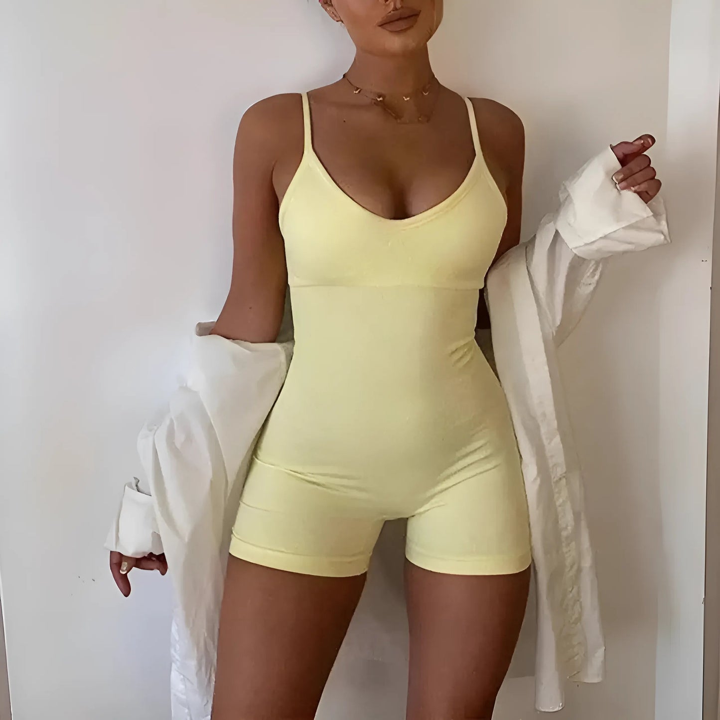 Yellow One-Piece Sports Outfit with Shorts